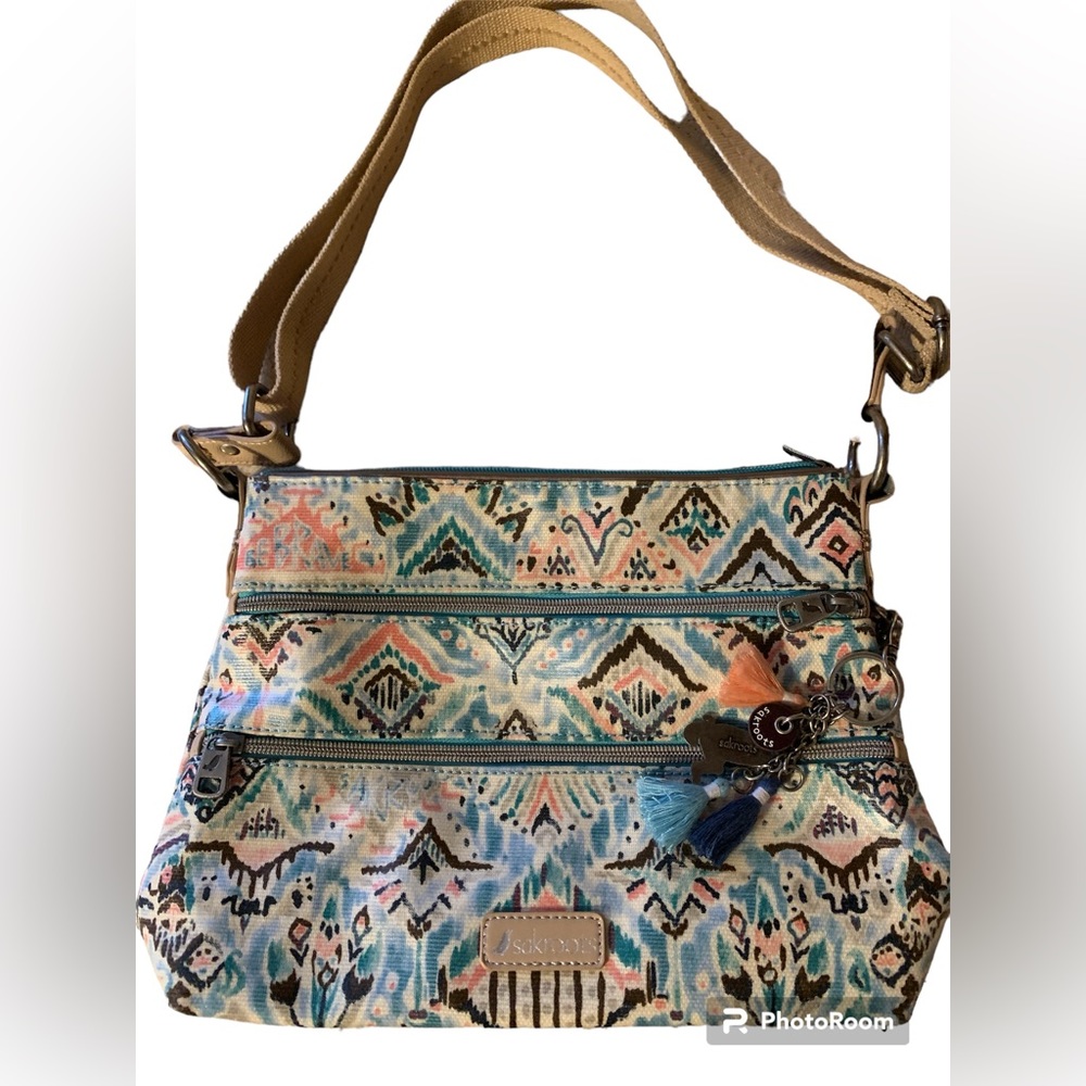Like New Sakroots Artist Circle Basic Crossbody in a turquoise Aztec-style print